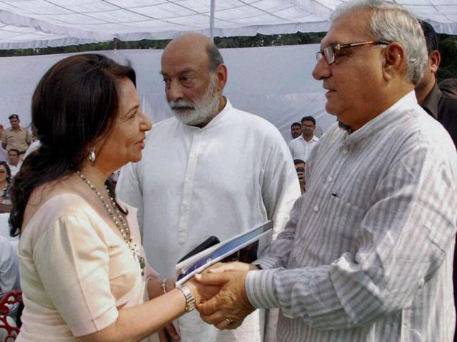 Sharmila Tagore in conversation with the Chief Minister of Haryana, Bhupinder Singh Hooda.