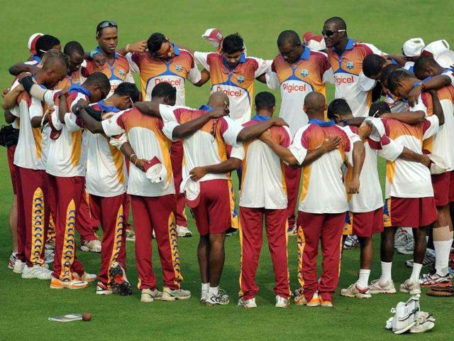 West Indies cricketers huddle during a training session at The Ferozeshah Kotla Stadium in New Delhi.