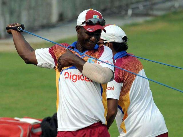 Windies captain Darren Sammy warms up during a training session at The Ferozeshah Kotla Stadium in New Delhi.