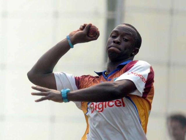 Kemar Roach bowls in the nets during a training session at The Ferozeshah Kotla Stadium in New Delhi.