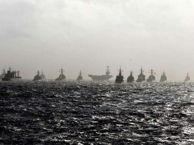 US Navy and Japan Maritime Self-Defense Force ships sail in formation during Annual Exercise 2011 in Pacific Ocean. The bilateral training exercise was designed to practice procedures required to effectively and mutually respond to the defense of Japan, or to a contingency in the region, the Navy said.
