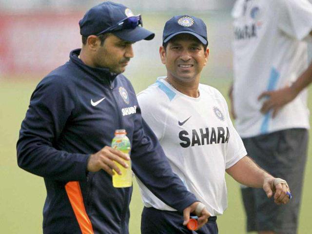 Virender Sehwag and Sachin Tendulkar during a practice session a day before the first Test match against West Indies in New Delhi.