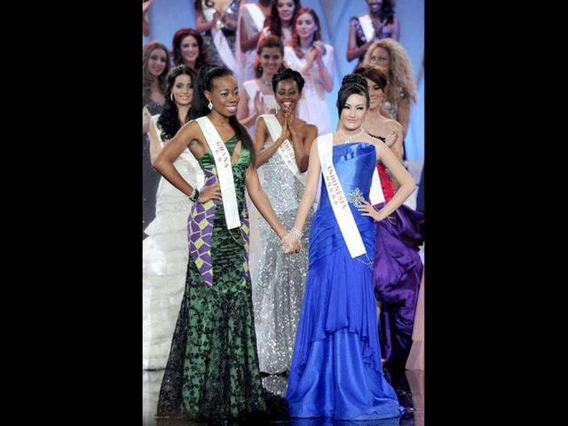 Miss Ghana Stephanie Adwoa Agyeiwaa Karikari (L) and Miss Indonesia Astrid Ellena Indriana Yunadi (R) pose after winning the Beauty with a Purpose round on November 6, 2011 during the finals of Miss World 2011 at Earls Court in London. (Photo: AFP)