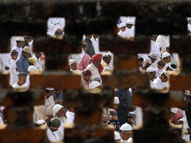 Muslims offer prayers during the religious festival of Eid-al-Adha in Allahabad. AP Photo/Rajesh Kumar Singh