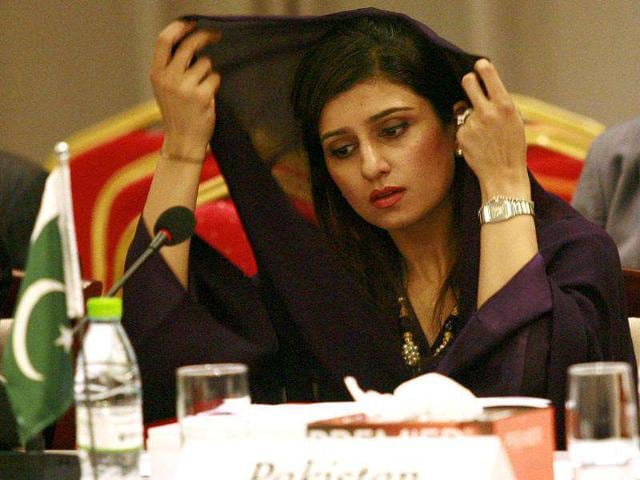 Pakistan's Foreign Minister Hina Rabbani Khar adjusts her scarf during the Saarc countries foreign ministers meeting in Addu.