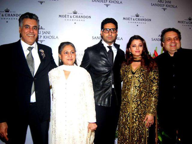 The couple poses with Jaya Bachchan and designer duo.