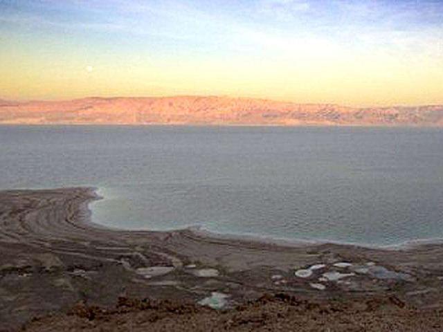 A picture shows the Israeli (bottom) and Jordanian (top) shores of the Dead Sea. The Dead Sea may soon shrink to a lifeless pond as Middle East political strife blocks vital measures needed to halt the decay of the world's lowest and saltiest body of water, experts say. AFP Photo/Jack Guez