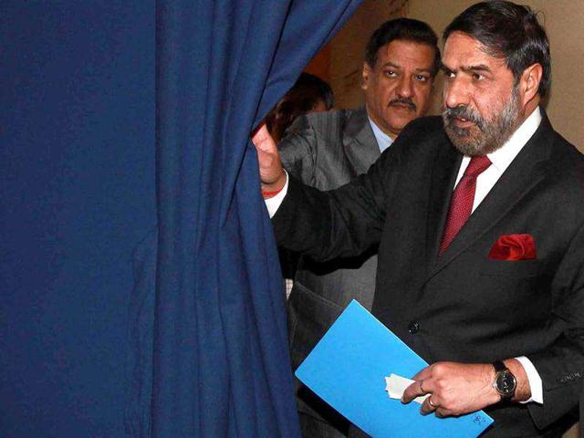 Anand Sharma, minister of commerce and industry, textiles of India and Prithviraj Chavan, chief minister of Maharashtra state at the plenary session at India economic summit in Mumbai.