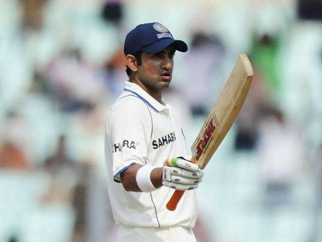 Gautam Gambir celebrates after scoring a half-century (50 runs) during the first day of the second Test cricket match between Indian and West Indies at The Eden Gardens in Kolkata.