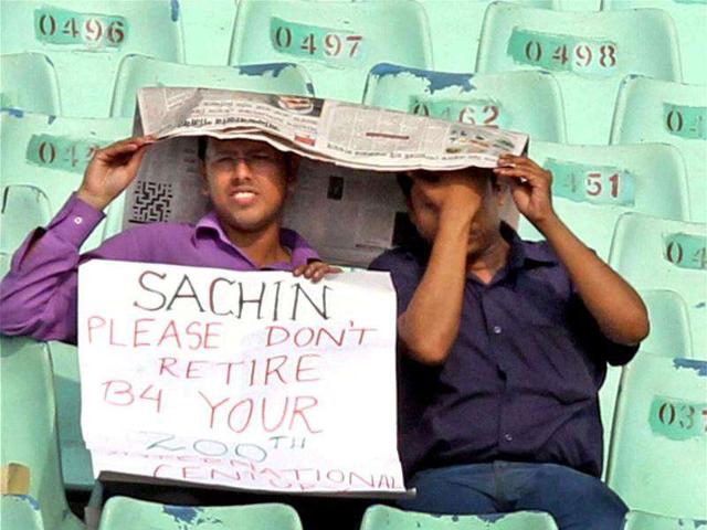 Indian supporters watch first day's play of the 2nd Test Match against West Indies at Eden Gardens in Kolkata.