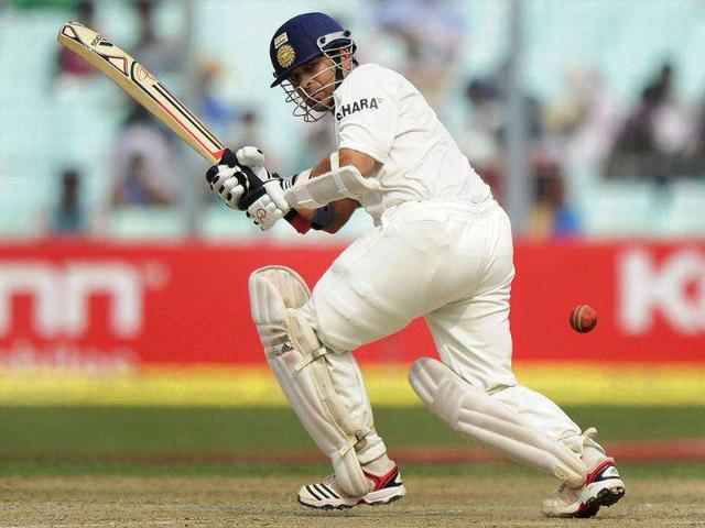 Sachin Tendulkar plays a shot during the first day of the second Test cricket match between India and West Indies at The Eden Gardens in Kolkata.