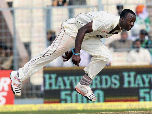 West Indies bowler Kemar Roach in action during 1st day of 2nd Test match at Eden Gardens in Kolkata.