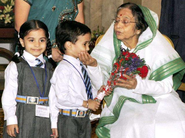 President Pratibha Devisingh Patil meets children from various sections of society on the occasion of Children’s Day at Rashtrapati Bhavan in New Delhi.