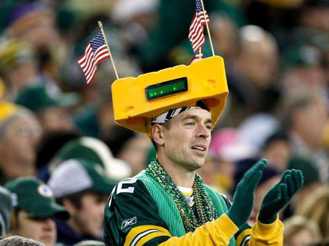 A Packers fan cheers after a touchdown during the game between the Green Bay Packers against the Minnesota Vikings at Lambeau Field in Green Bay, Wisconsin. (AFP Photo)