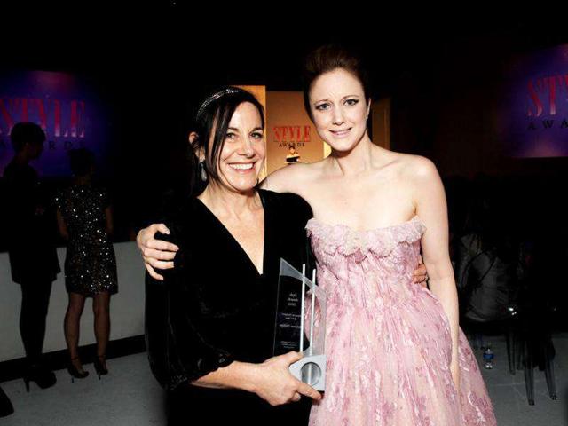 Arianne Phillips (left) was awarded the Costume Designer of the Year prize by rising actor Andrea Riseborough (right).