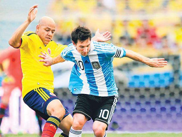 Argentina-s-Lionel-Messi-right-is-challenged-by-Colombia-s-Gustavo-Bolivar-during-their-World-Cup-qualifier--AFP-Photo Argentina-s-Lionel-Messi-right-is-challenged-by-Colombia-s-Gustavo-Bolivar-during-their-World-Cup-qualifier--AFP-Photo
