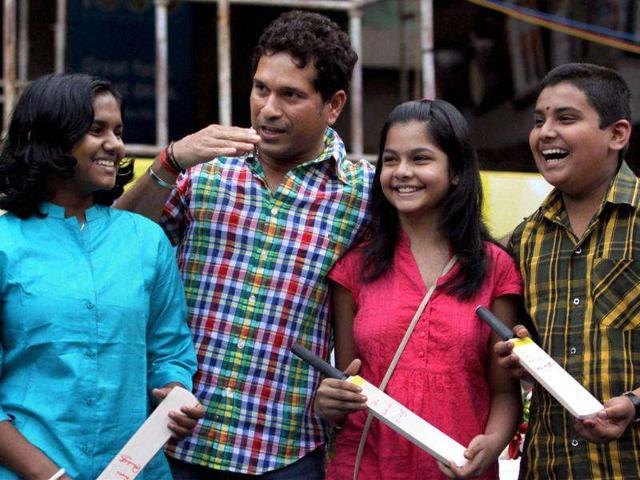Master-blaster-Sachin-Tendulkar-interacts-with-children-during-the-opening-ceremony-of-an-educational-event-in-Mumbai