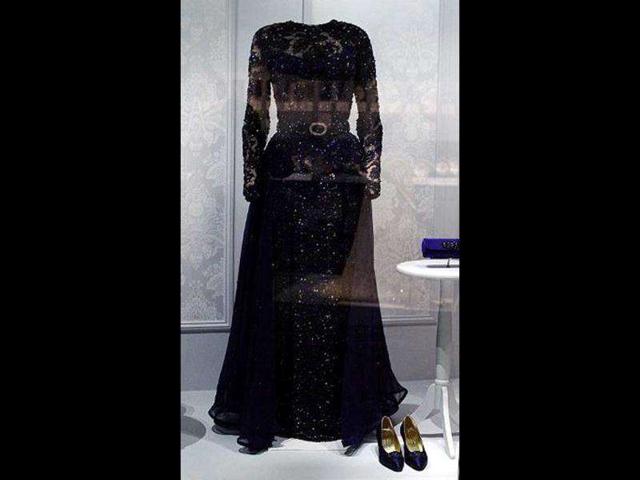 A dress and accessories of former US First Lady Hillary Clinton is displayed at the Smithsonian’s National Museum of American History in Washington, DC.