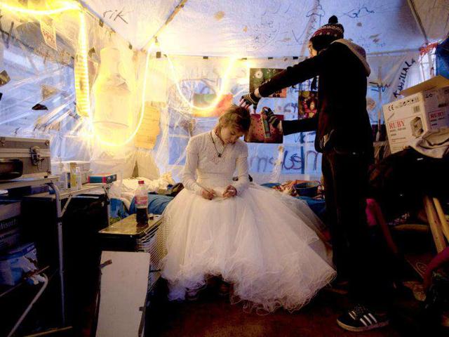 Eveline Constance Heijkamp, a 22-year-old Occupy Amsterdam demonstrator, prepares for her wedding to Gijs Peskens (not pictured) in a tent on the Beursplein in Amsterdam.
