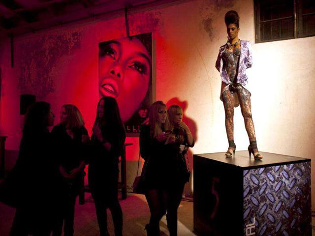 A model stands on a podium during the reception for the fashion show by Italian designer Roberto Cavalli as part of the Fashion Week in Tel Aviv. Reuters