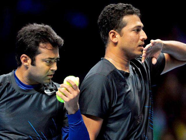 Leander-Paes-L-and-his-partner-Mahesh-Bhupathi-of-India-R-talk-between-points-against-Jurgen-Melzer-of-Austria-and-his-partner-Philipp-Petzschner-of-Germany-during-their-group-A-doubles-match-in-the-round-robin-stage-on-day-four-of-the-ATP-World-Tour-Finals-tennis-tournament-in-London-AFP-Photo-Leon-Neal