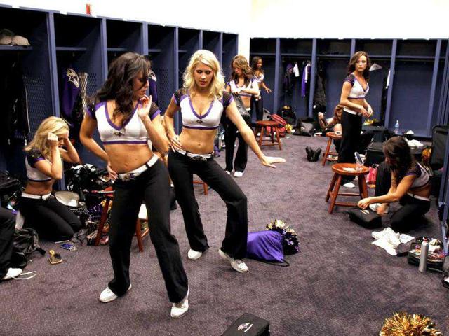 Baltimore Ravens cheerleaders prep in their locker room.
