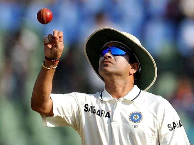 Sachin-Tendulkar-tosses-a-ball-while-fielding-during-fifth-day-s-play-of-the-third-Test-cricket-match-between-India-and-the-West-Indies-at-The-Wankhede-stadium-in-Mumbai