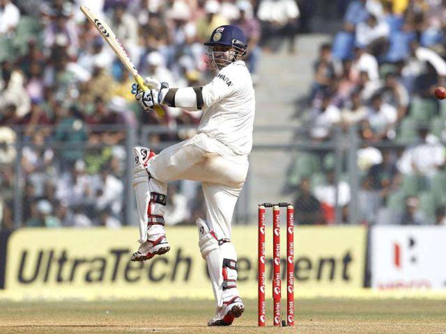 Virender Sehwag plays a shot during the final day of their third and final Test cricket match against West Indies in Mumbai.