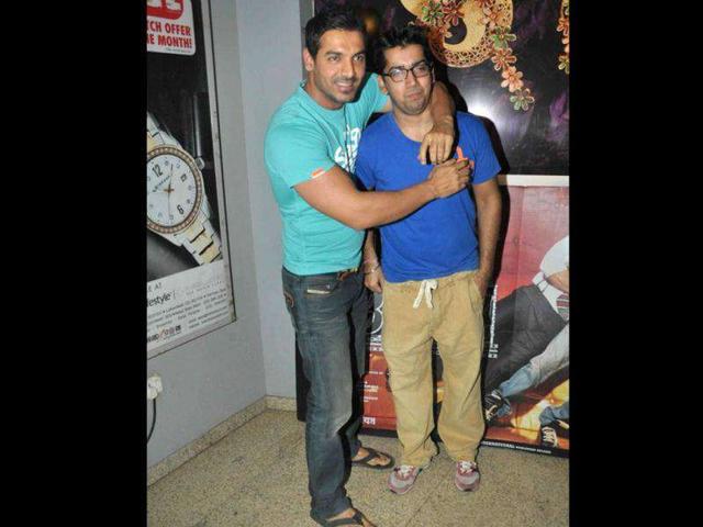 John Abraham in a candid moment with director Rohit Dhawan.