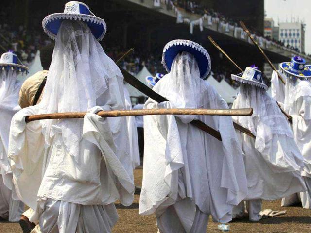 Eyo masquerades dance through Tafawa Balewa Square in Lagos, Nigeria to honour the death of a prominent Lagos chief Yusufu Abiodun Oniru.