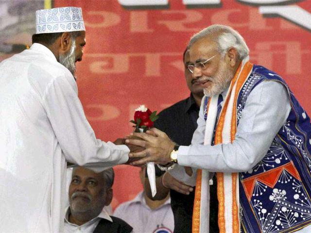 Gujarat-chief-minister-Narendra-Modi-being-greeted-by-a-Muslim-cleric-during-his-Sadbhavna-Mission-fast-at-Rajpipla-town-head-quarter-of-Narmada--District-PTI