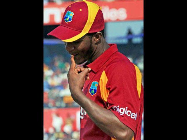 West Indies captain Darren Sammy during the toss before the start of the 1st ODI cricket match against India in Cuttack.