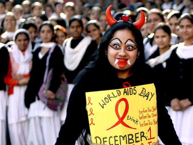 A college student dresses up during an event to commemorate World AIDS Day in Jammu. More than 2 million people in India suffer from HIV/AIDS.