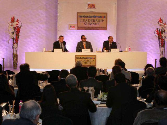 Dr Kaushik Basu, Norman Pearlstine, chief content officer, Bloomberg L.P and R Sukumar during the HT Leadership Summit 2011 at The Taj Palace Hotel in New Delhi. HT Photo Mahendra Parikh