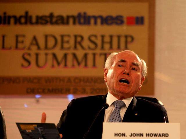 Former Australian president John Howard speaks during a session at HT Leadership Summit 2011 in New Delhi. HT Photo by Sanjeev Verma