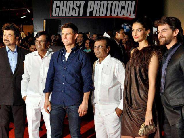 The Players team - Abbas-Mustan, Sonam Kapoor, Neil Nitin Mukesh pose with Hollywood actor Tom Cruise and Anil Kapoor. AFP photo