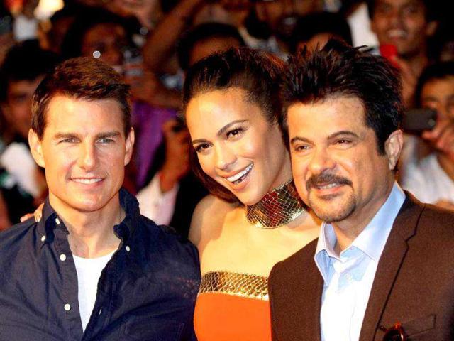 The trio brightens the event with their smiles. AFP photo