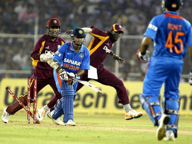 West Indies celebrates the wicket of Parthiv Patel at Sardar Patel Gujarat Stadium in Ahmedabad. HT photo/Anshuman Poyrekar