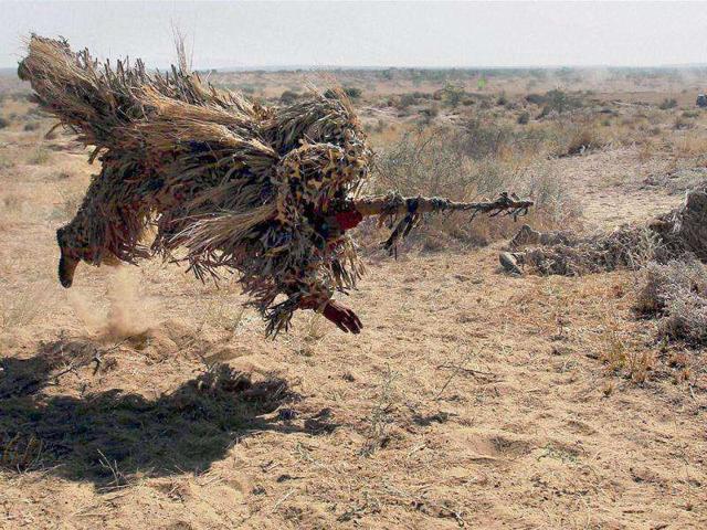 An Indian Army jawan participates in the Indian Army exercise Sudarshan Shakti at Bugundi battle-field near Barmer in Rajasthan.