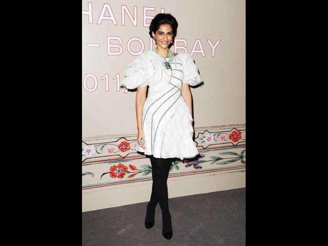 In January, Sonam visited the Elie Saab Paris Couture Week on the special invitation of French haute couturer, Jean Paul Gaultier. Sonam Kapoor wore a black and white dress from Chanel's spring 2012 collection at Paris Fashion Week.