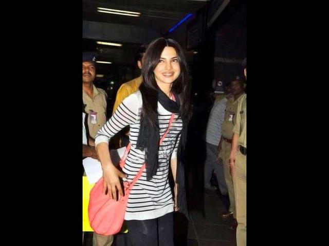 Priyanka Chopra finally smiles for shutterbugs. But is it a forced one?
