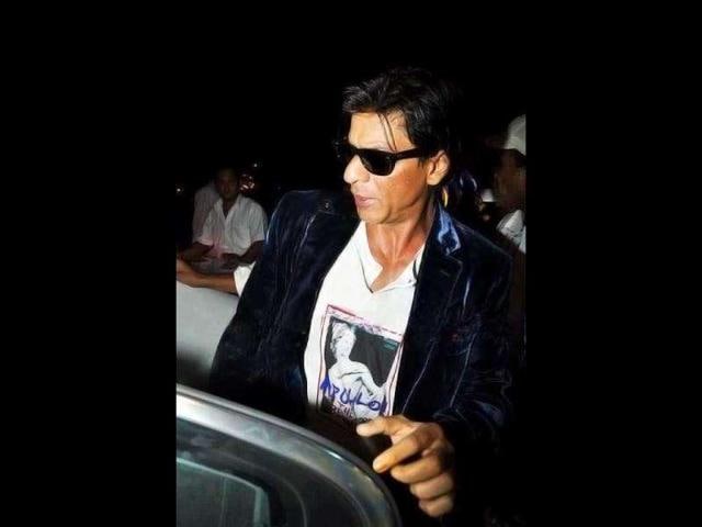 SRK looks every bit his Don character here.