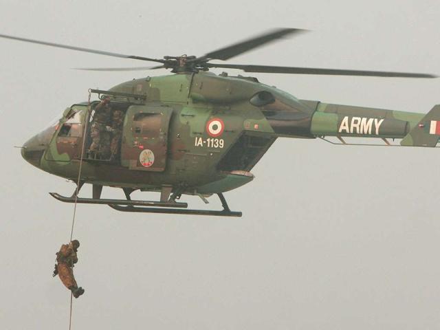 A spectacular military tattoo with commando raid at the RCTC ( Race Course ) grounds marked the commencement of the 40th Vijay Diwas celebrations in Kolkata. (Ashok nath dey/HT Photo)