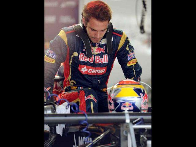 File-photo-of-French-F-1-driver-Jean-Eric-Vergne-getting-into-his-Toro-Rosso-s-cockpit-in-Sao-Paulo-AFP-Antonio-Scorza File-photo-of-French-F-1-driver-Jean-Eric-Vergne-getting-into-his-Toro-Rosso-s-cockpit-in-Sao-Paulo-AFP-Antonio-Scorza