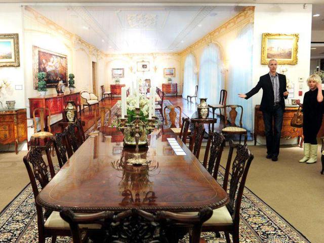 Display of Regency Style Dining Table, estimated between US$800-1000.00 during a press preview for the sale of fine art and furnishings from Michael Jackson's home on Dec 12,at Julien's Auctions, Beverly Hills, California. (AFP PHOTO / Frederic J. Brown)