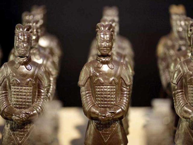 Chocolate-made terracotta warriors are displayed at a new chocolate theme-park in Shanghai, China. AP Photo/Eugene Hoshiko