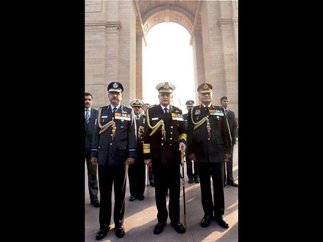 Services' chiefs Air Chief Marshal NAK Browne, Admiral Nirmal Verma and General V K Singh at Amar Jawan Jyoti on the anniversary of 'Vijay Diwas', in New Delhi.