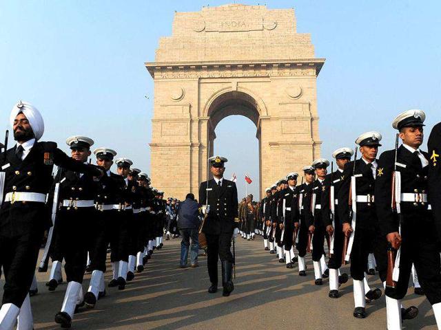 Indian Navy personnel march past India Gate following Vijay Divas celebrations in New Delhi.