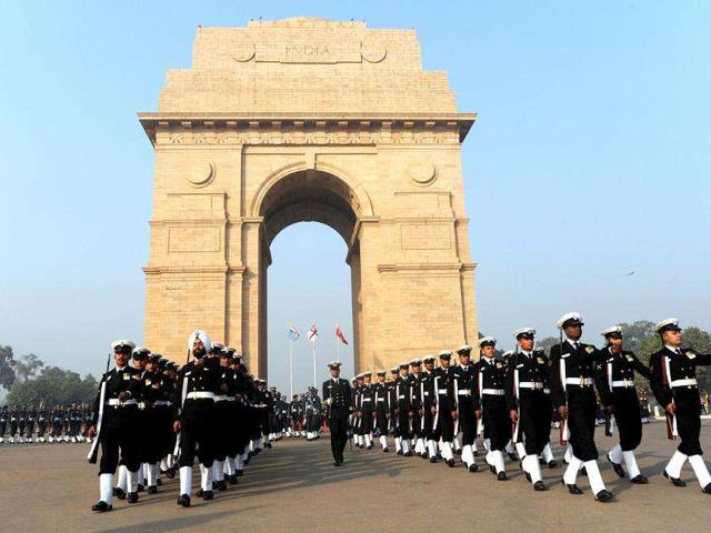 Indian Navy personnel march past India Gate following Vijay Divas celebrations in New Delhi.