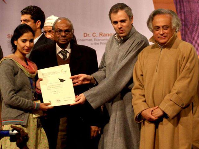 Omar Abdullah distributes appointment letters under Himayat project launched to provide skill development training to the unemployed youth of Jammu and Kashmir during a function held in Srinagar. HT Photo/Waseem Andrab